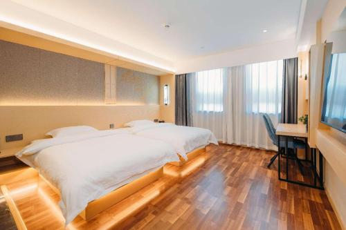 Imagen de la habitación del Hotel Derreal - Beijing Shunyi Guozhan Branch. Foto 17