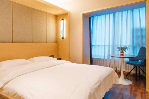 Imagen de la habitación del Hotel Derreal - Beijing Shunyi Guozhan Branch. Foto 18
