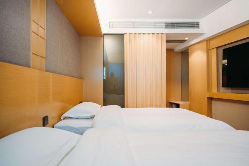 Imagen de la habitación del Hotel Derreal - Beijing Shunyi Guozhan Branch. Foto 19