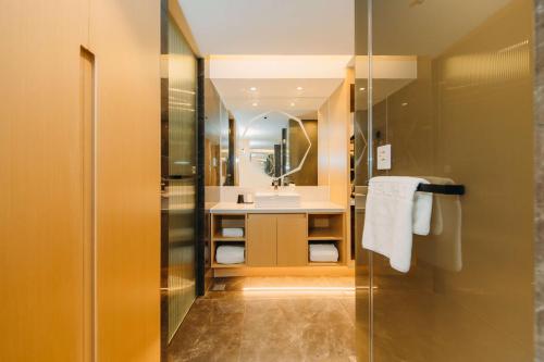 Imagen de la habitación del Hotel Derreal - Beijing Shunyi Guozhan Branch. Foto 20