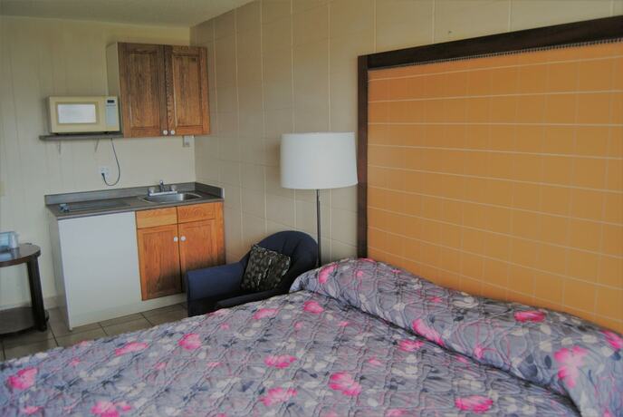 Imagen de la habitación del Hotel Derrick Motel. Foto 19