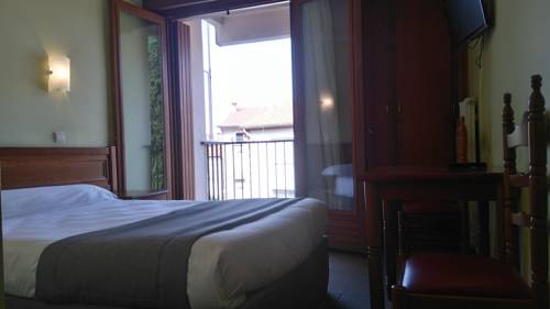 Imagen de la habitación del Hotel Des Arcades. Foto 3