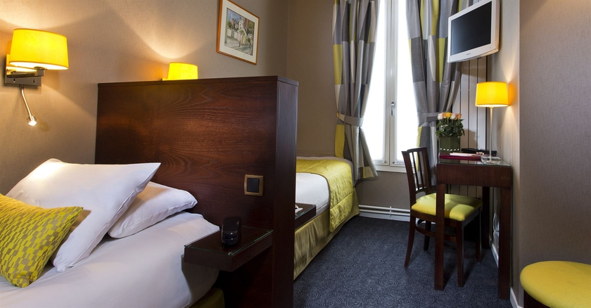 Imagen de la habitación del Hotel Des Arts Paris Montmartre. Foto 6