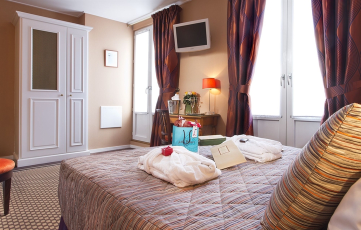 Imagen de la habitación del Hotel Des Arts Paris Montmartre. Foto 7