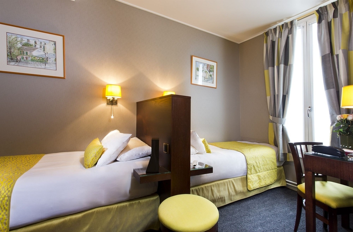 Imagen de la habitación del Hotel Des Arts Paris Montmartre. Foto 8