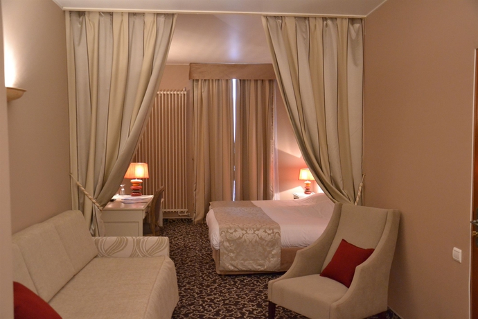 Imagen de la habitación del Hotel Des Augustins. Foto 9