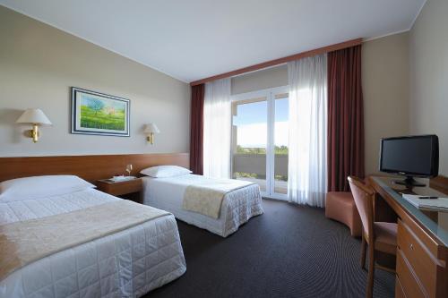 Imagen de la habitación del Hotel Des Bains Terme. Foto 10