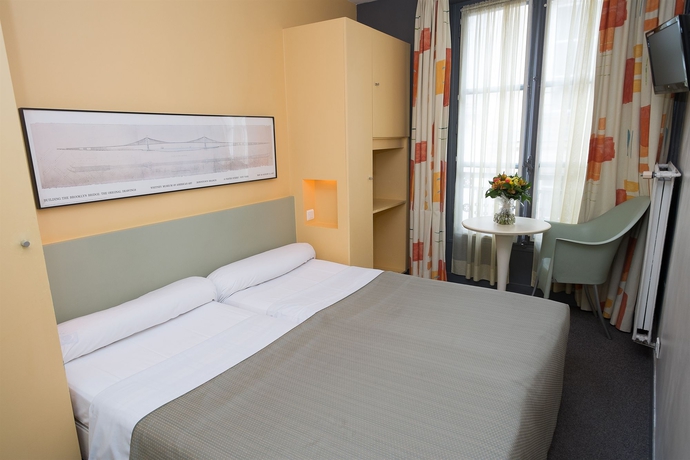 Imagen de la habitación del Hotel Des Canettes. Foto 12