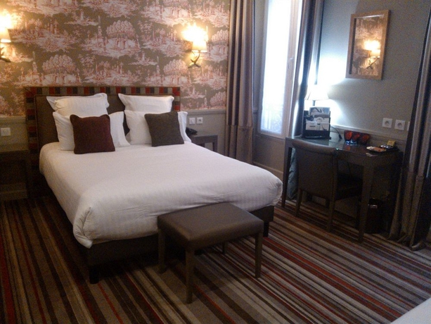 Imagen de la habitación del Hotel Des Comédies. Foto 9