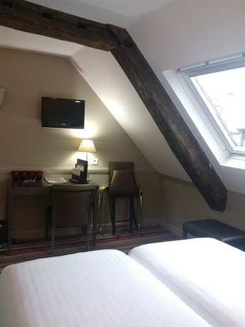 Imagen de la habitación del Hotel Des Comédies. Foto 10