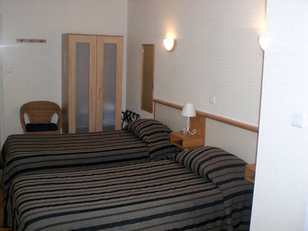 Imagen de la habitación del Hotel Des Crêtes De Pignols. Foto 13