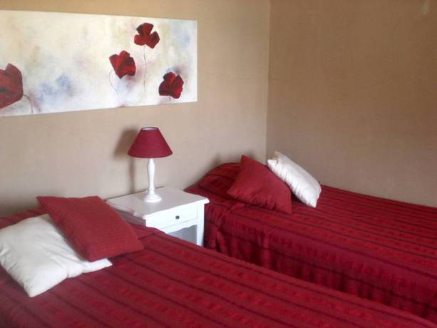 Imagen de la habitación del Hotel Des Crêtes De Pignols. Foto 16