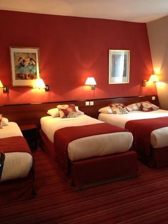 Imagen de la habitación del Hotel Des Deux Avenues. Foto 6