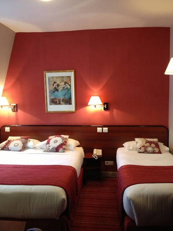 Imagen de la habitación del Hotel Des Deux Avenues. Foto 8