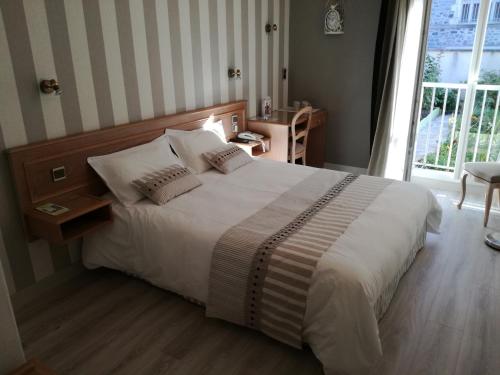Imagen de la habitación del Hotel Des Deux moulins. Foto 7