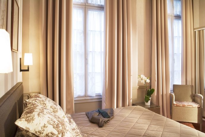 Imagen de la habitación del Hotel Des Deux-Iles. Foto 8