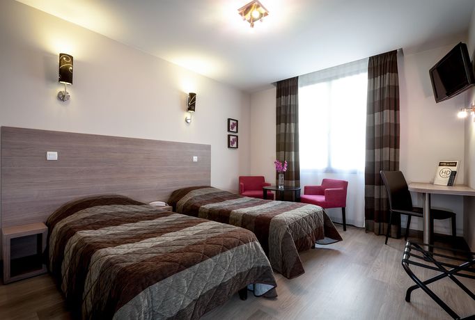 Imagen de la habitación del Hotel Des Ducs. Foto 3