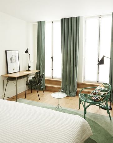 Imagen de la habitación del Hotel Des Galeries. Foto 3