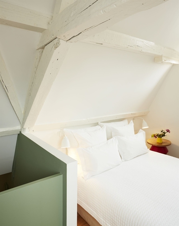 Imagen de la habitación del Hotel Des Galeries. Foto 6