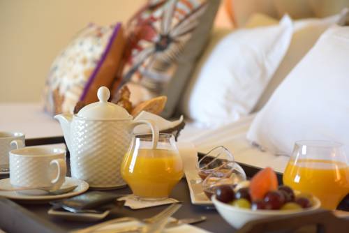 Imagen de la habitación del Hotel Des Gouverneurs. Foto 15