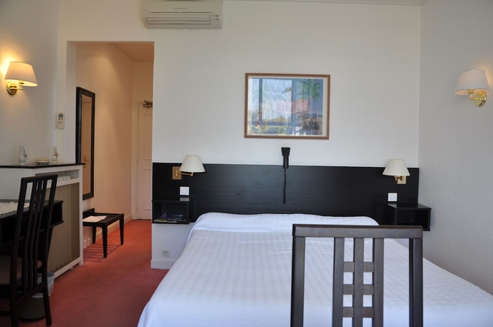 Imagen de la habitación del Hotel Des Mimosas. Foto 11