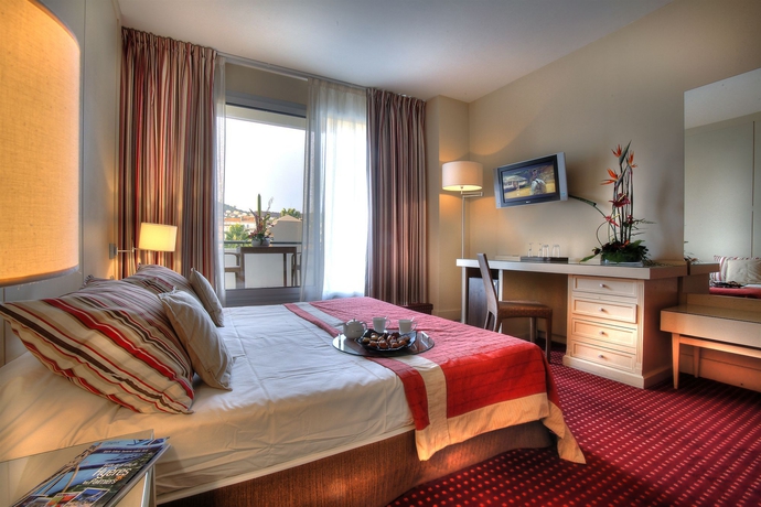 Imagen de la habitación del Hotel Des Palmiers. Foto 6