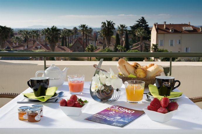 Imagen de la habitación del Hotel Des Palmiers. Foto 8