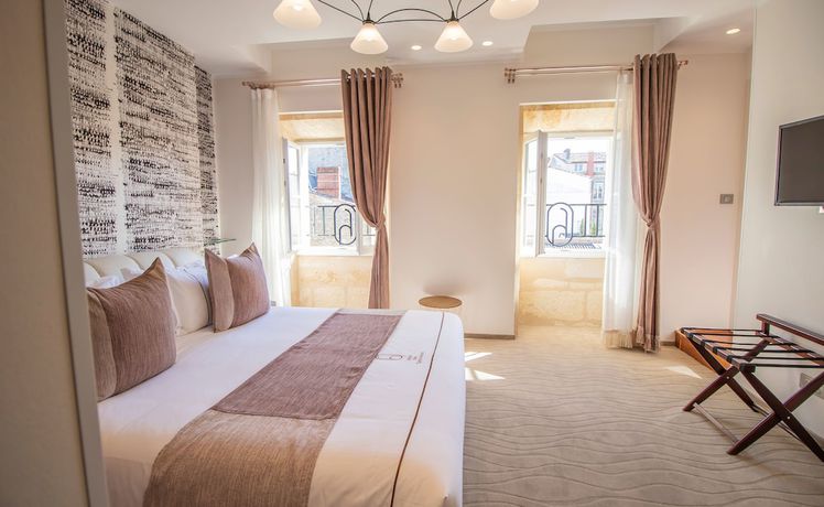 Imagen de la habitación del Hotel Des Quinconces. Foto 3