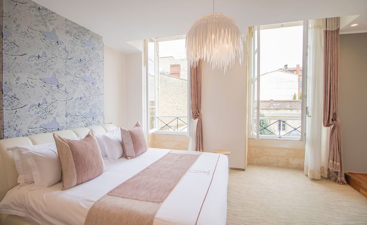 Imagen de la habitación del Hotel Des Quinconces. Foto 14