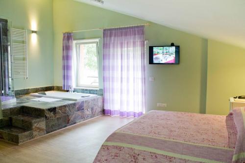 Imagen de la habitación del Hotel Des Reves - Al Poggio Di Casalucense. Foto 5