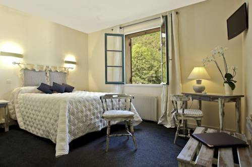Imagen de la habitación del Hotel Des Roches, LES EYZIES DE TAYAC SIREUIL. Foto 5
