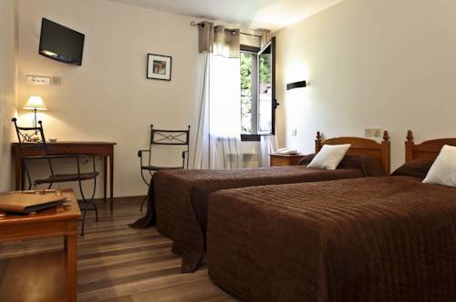 Imagen de la habitación del Hotel Des Roches, LES EYZIES DE TAYAC SIREUIL. Foto 6
