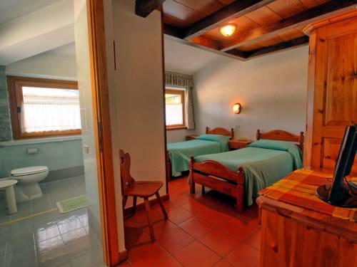 Imagen de la habitación del Hotel Des Roses, Saint-Pierre. Foto 7