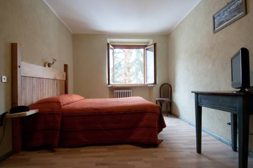 Imagen de la habitación del Hotel Des Roses, Saint-Pierre. Foto 8