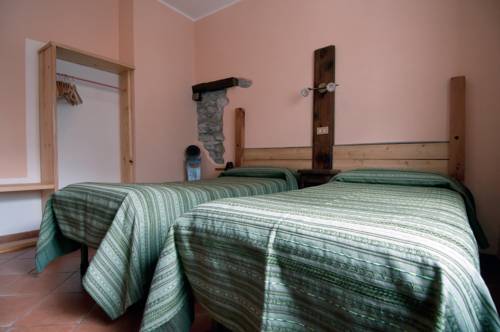 Imagen de la habitación del Hotel Des Roses, Saint-Pierre. Foto 9
