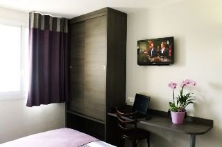 Imagen de la habitación del Hotel Des Rosiers. Foto 6