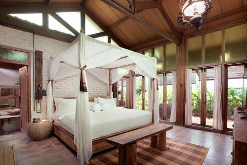 Imagen de la habitación del Hotel Desa Alamanis Resort Vila. Foto 7