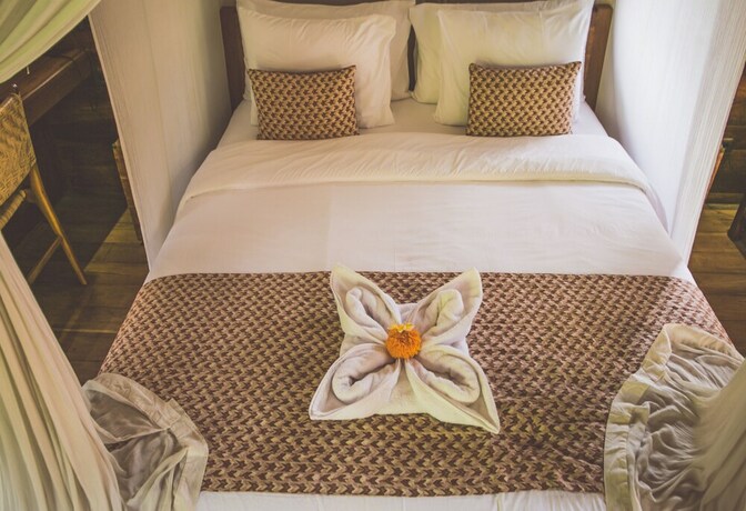 Imagen de la habitación del Hotel Desa Saya Eco Luxury Resort and Spa. Foto 15