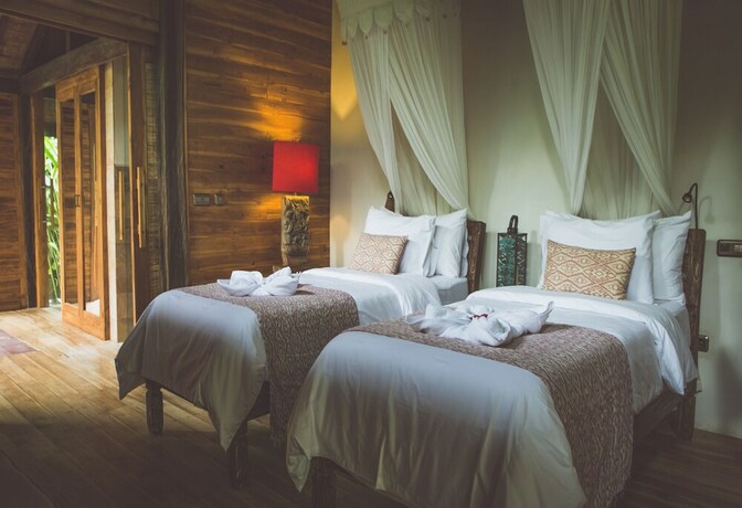Imagen de la habitación del Hotel Desa Saya Eco Luxury Resort and Spa. Foto 26