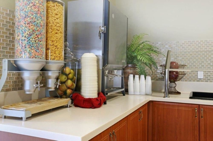 Imagen del bar/restaurante del Hotel Desert Palms and Suites. Foto 2