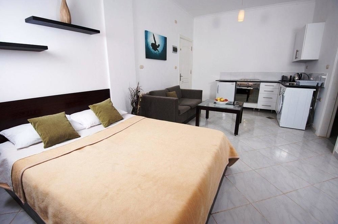 Imagen de la habitación del Hotel Desert Pearl Apartments. Foto 4