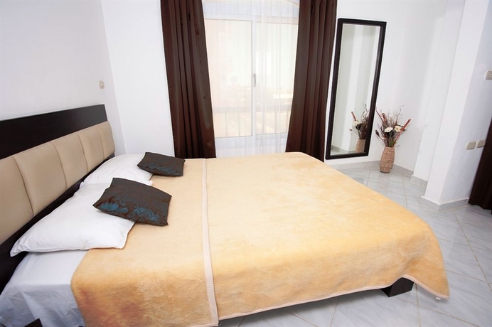 Imagen de la habitación del Hotel Desert Pearl Apartments. Foto 6