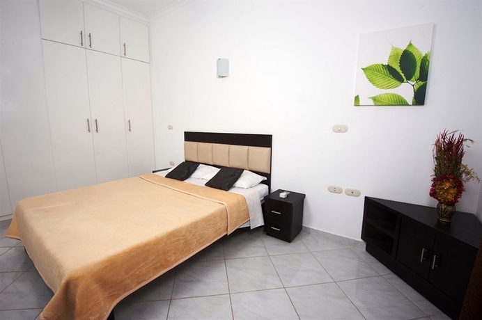 Imagen de la habitación del Hotel Desert Pearl Apartments. Foto 7