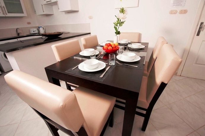 Imagen de la habitación del Hotel Desert Pearl Apartments. Foto 10