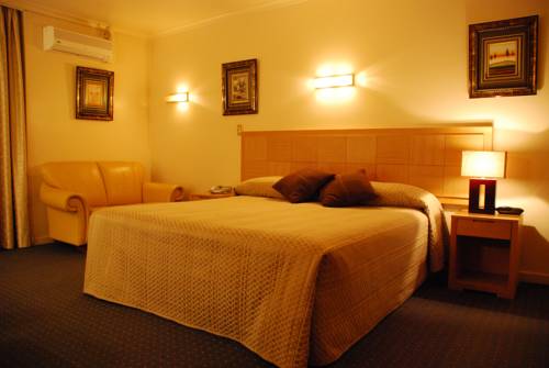 Imagen de la habitación del Hotel Desert Sand Motor Inn. Foto 1