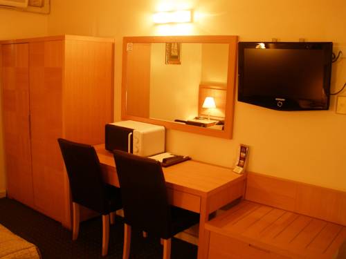 Imagen de la habitación del Hotel Desert Sand Motor Inn. Foto 4