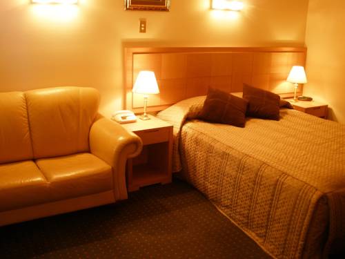 Imagen de la habitación del Hotel Desert Sand Motor Inn. Foto 5