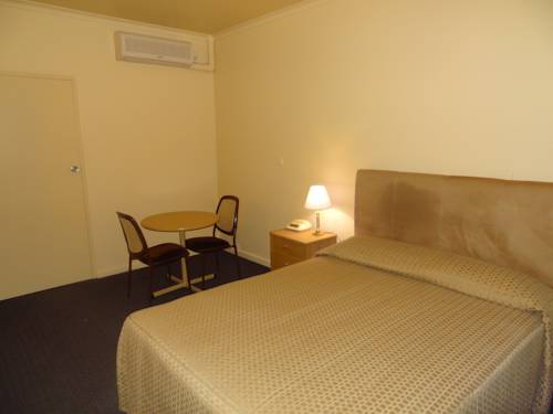 Imagen de la habitación del Hotel Desert Sand Motor Inn. Foto 6