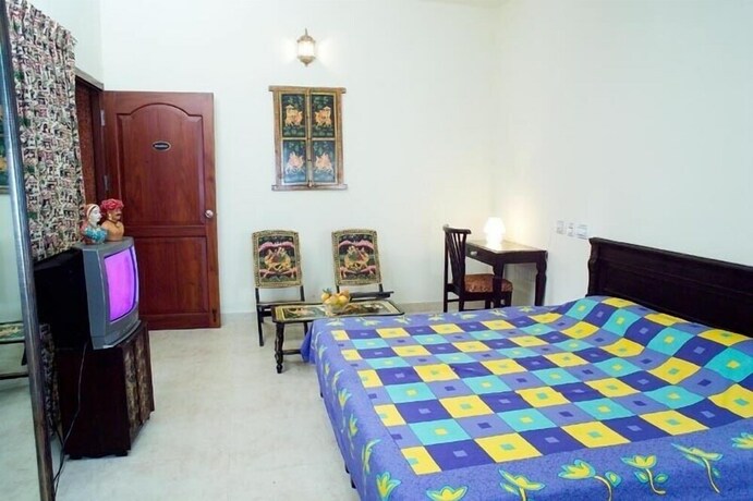 Imagen de la habitación del Hotel Deshadan Cliff and Beach Resort. Foto 22