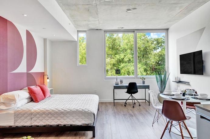 Imagen de la habitación del Hotel Design District Suites. Foto 3